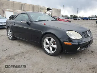 2002 Mercedes-Benz SLK 320 z VIN WDBKK65F12F250431, wystawiony jako Copart lot #86139214 z przebiegiem 72 356 mil mil oraz Czysty tytuł • Clean title. Historia ofert i sprzedaży dostępna na DreamBid. Obrazek 4.