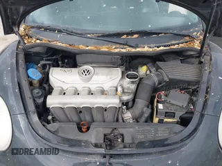 2010 Volkswagen New Beetle Coupe with VIN 3VWPG3AG9AM015051, listed as a IAAI auction lot 42052771 with 163,728 mi miles. Bid and sale history available at carsss.com. Image 10.