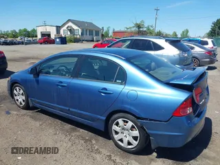 2006 Honda Civic LX with VIN JHMFA16586S000128, listed as a IAAI auction lot 42138350 with 127,253 mi miles and . Bid and sale history available at DreamBid. Image 3.
