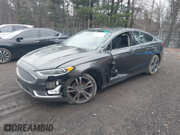 2019 Ford Fusion Titanium with VIN 3FA6P0D93KR124299, listed as a IAAI auction lot 40182478 with 73,408 mi miles. Bid and sale history available at carsss.com. Image 2.