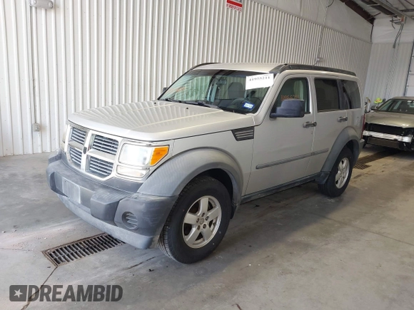 2007 Dodge Nitro SXT z VIN 1D8GT28K17W615978, wystawiony jako IAAI lot #41955211 z przebiegiem 142 741 mil mil oraz . Historia ofert i sprzedaży dostępna na DreamBid. Obrazek 2.