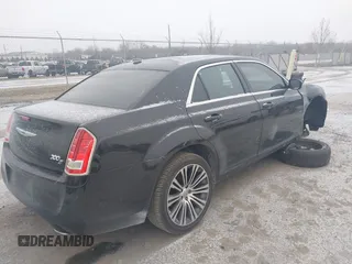 2013 Chrysler 300 with VIN 2C3CCABT7DH652797, listed as a IAAI auction lot 41602405 with 203,920 mi miles. Bid and sale history available at carsss.com. Image 4.