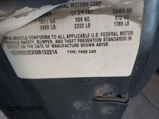 2005 Pontiac Grand Am SE with VIN 1G2NE52EX5M102214, listed as a IAAI auction lot 41767326 with 168,979 mi miles. Bid and sale history available at carsss.com. Image 9.