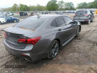 2018 Acura TLX w/A-SPEC Pkg with VIN 19UUB2F66JA002402, listed as a IAAI auction lot 41960832 with 91,643 mi miles. Bid and sale history available at carsss.com. Image 4.