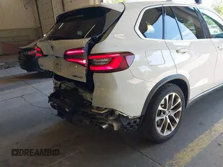 2022 BMW X5 xDrive40i with VIN 5UXCR6C09N9M21945, listed as a IAAI auction lot 42170363 with 23,537 mi miles and . Bid and sale history available at DreamBid. Image 22.