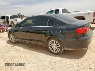 2014 Volkswagen Jetta TDI w/Premium with VIN 3VW3L7AJ2EM443384, listed as a Copart auction lot 56748125 with 137,987 mi miles and Salvage title. Bid and sale history available at DreamBid. Image 2.