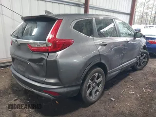 2018 Honda CR-V EX with VIN 7FARW2H56JE043542, listed as a IAAI auction lot 41560270 with 104,237 mi miles and . Bid and sale history available at DreamBid. Image 4.