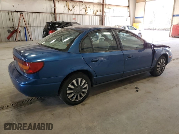 2001 Saturn SL z VIN 1G8ZK52791Z210421, wystawiony jako Copart lot #48808595 z przebiegiem 98 960 mil mil oraz Szkoda całkowita • Salvage title. Historia ofert i sprzedaży dostępna na DreamBid. Obrazek 3.