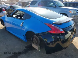 2012 Nissan 370Z Touring with VIN JN1AZ4EH5CM561472, listed as a IAAI auction lot 41640522 with 101,143 mi miles. Bid and sale history available at carsss.com. Image 3.