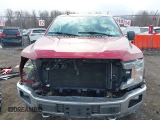 2018 Ford F-150 XL z VIN 1FTFX1E5XJFB66587, wystawiony jako IAAI lot #41870713 z przebiegiem 72 991 mil mil oraz . Historia ofert i sprzedaży dostępna na DreamBid. Obrazek 13.