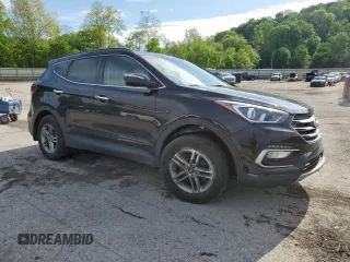 2017 Hyundai Santa Fe 2.4L z VIN 5XYZUDLB1HG412675, wystawiony jako Copart lot #57169045 z przebiegiem 38 947 mil mil oraz Szkoda całkowita • Salvage title. Historia ofert i sprzedaży dostępna na DreamBid. Obrazek 4.