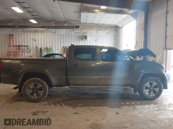 2016 Toyota Tacoma SR5 with VIN 5TFDZ5BN8GX012377, listed as a IAAI auction lot 41688620 with 138,531 mi miles and . Bid and sale history available at DreamBid. Image 13.