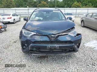 2018 Toyota RAV4 XLE with VIN 2T3WFREVXJW483012, listed as a Copart auction lot 58806205 with 48,266 mi miles and Salvage title. Bid and sale history available at DreamBid. Image 5.