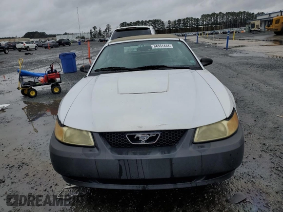 2004 Ford Mustang Deluxe with VIN 1FAFP446X4F179975, listed as a Copart auction lot 84551444 with 75,919 mi miles and Salvage Title. Bid and sale history available at carsss.com. Image 5.