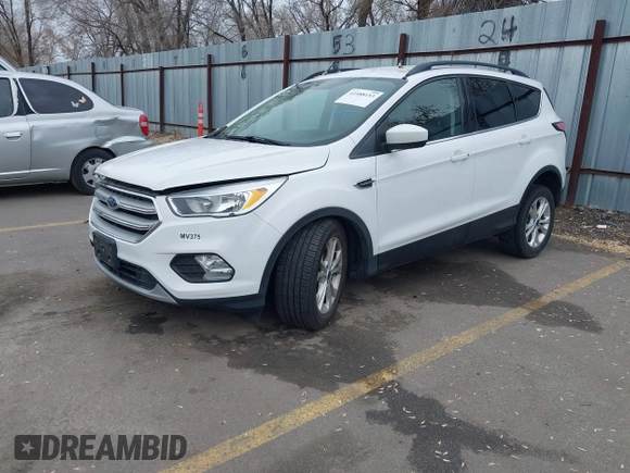 2018 Ford Escape SE z VIN 1FMCU9GD0JUC62783, wystawiony jako IAAI lot #41488153 z przebiegiem 55 774 mil mil oraz . Historia ofert i sprzedaży dostępna na DreamBid. Obrazek 17.