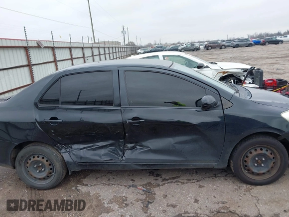 2012 Toyota Yaris with VIN JTDBT4K31CL025197, listed as a IAAI auction lot 41424640 with 165,731 mi miles. Bid and sale history available at carsss.com. Image 13.