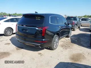 2022 Cadillac XT6 Premium Luxury with VIN 1GYKPCRS3NZ156413, listed as a IAAI auction lot 41952856 with 40,046 mi miles and . Bid and sale history available at DreamBid. Image 4.