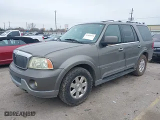 2004 Lincoln Navigator Luxury with VIN 5LMFU27RX4LJ41623, listed as a IAAI auction lot 41565114 with 214,590 mi miles. Bid and sale history available at carsss.com. Image 17.