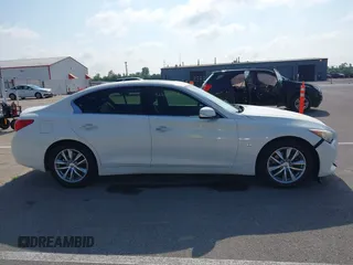 2014 Infiniti Q50 Sport with VIN JN1BV7AR4EM698230, listed as a IAAI auction lot 42664588 with 129,411 mi miles and . Bid and sale history available at DreamBid. Image 13.