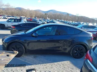 2024 Tesla Model Y Long Range with VIN 7SAYGDEE7RF199673, listed as a IAAI auction lot 41263305 with 3,137 mi miles and . Bid and sale history available at DreamBid. Image 14.