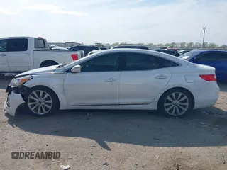 2015 Hyundai Azera Limited with VIN KMHFH4JG7FA476458, listed as a IAAI auction lot 41893979 with 149,114 mi miles and . Bid and sale history available at DreamBid. Image 14.