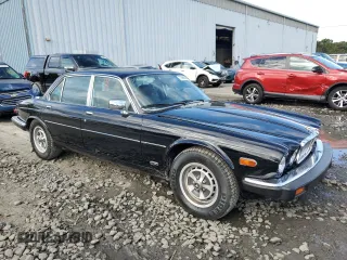 1986 Jaguar XJ z VIN SAJAV1341GC458926, wystawiony jako Copart lot #73985024 z przebiegiem 73 337 mil mil oraz Czysty tytuł • Clean title. Historia ofert i sprzedaży dostępna na DreamBid. Obrazek 4.