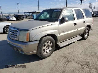 2002 Cadillac Escalade z VIN 1GYEC63T92R129093, wystawiony jako Copart lot #47423065 z przebiegiem 233 006 mil mil oraz Szkody całkowita. Historia ofert i sprzedaży dostępna na DreamBid. Obrazek 1.