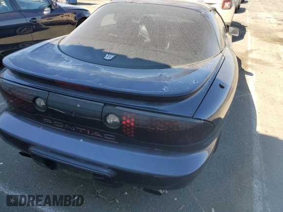 2000 Pontiac Firebird Firebird z VIN 2G2FS22K8Y2116172, wystawiony jako Copart lot #68748904 z przebiegiem Nie podano mil oraz Czysty tytuł • Clean title. Historia ofert i sprzedaży dostępna na DreamBid. Obrazek 6.