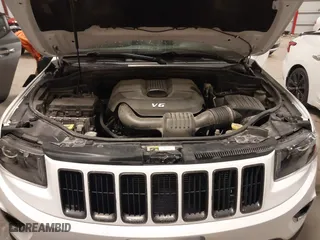 2015 Jeep Grand Cherokee Altitude with VIN 1C4RJFAG2FC905673, listed as a IAAI auction lot 41334271 with 160,531 mi miles. Bid and sale history available at carsss.com. Image 10.