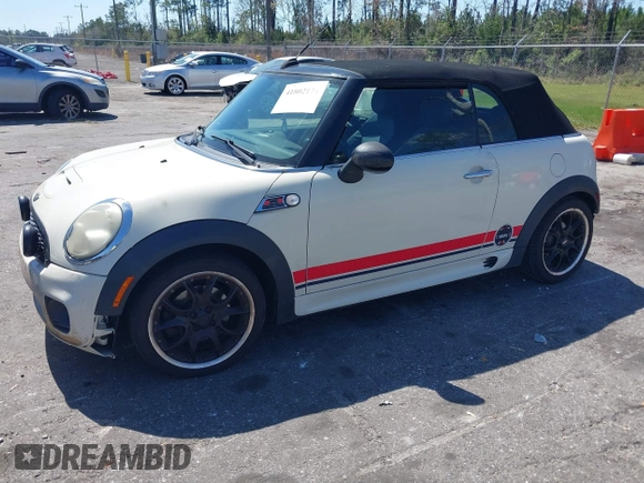 2010 MINI Convertible S with VIN WMWMS3C57ATY51245, listed as a IAAI auction lot 41802174 with 110,154 mi miles and . Bid and sale history available at DreamBid. Image 2.