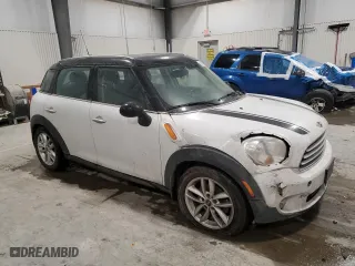 2013 MINI Cooper Countryman with VIN WMWZB3C55DWM31248, listed as a Copart auction lot 45503555 with 143,483 mi miles and Salvage Title. Bid and sale history available at carsss.com. Image 4.