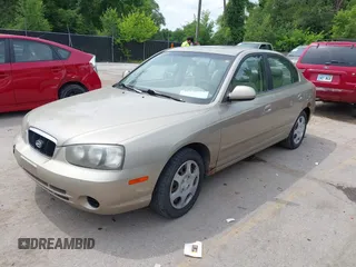 2003 Hyundai Elantra GLS z VIN KMHDN45D73U556305, wystawiony jako IAAI lot #42478211 z przebiegiem 149 648 mil mil oraz . Historia ofert i sprzedaży dostępna na DreamBid. Obrazek 2.