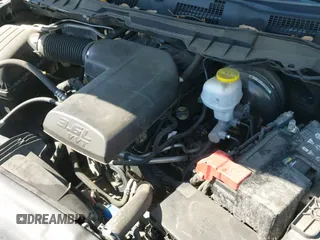 2020 Ram 1500 Tradesman z VIN 1C6RR6FG7LS153348, wystawiony jako IAAI lot #41977543 z przebiegiem 69 604 mil mil oraz . Historia ofert i sprzedaży dostępna na DreamBid. Obrazek 19.