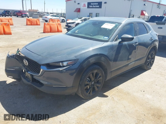 2024 Mazda CX-30 S Preferred with VIN 3MVDMBCM5RM606886, listed as a IAAI auction lot 41867949 with 15,410 mi miles and . Bid and sale history available at DreamBid. Image 2.