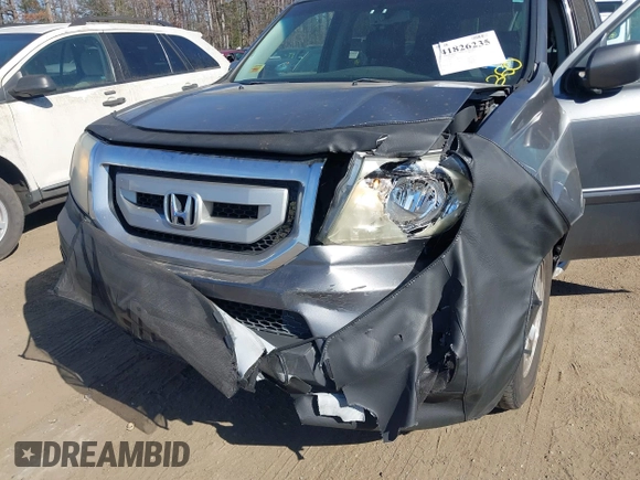 2011 Honda Pilot EX-L with VIN 5FNYF4H69BB015375, listed as a IAAI auction lot 41826235 with 199,171 mi miles and . Bid and sale history available at carsss.com. Image 6.