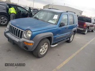 2004 Jeep Liberty Sport with VIN 1J4GK48K84W147282, listed as a IAAI auction lot 41888043 with 211,043 mi miles and . Bid and sale history available at DreamBid. Image 2.