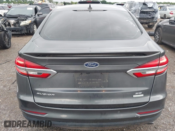 2020 Ford Fusion SE z VIN 3FA6P0HD5LR198744, wystawiony jako IAAI lot #42177820 z przebiegiem 97 520 mil mil oraz . Historia ofert i sprzedaży dostępna na DreamBid. Obrazek 16.