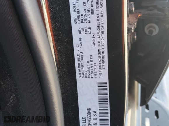 2023 Ram 1500 Lone Star with VIN 1C6RREBTXPN553048, listed as a Copart auction lot 46255525 with 59,497 mi miles and Salvage Title. Bid and sale history available at carsss.com. Image 12.