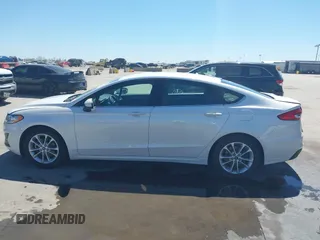 2019 Ford Fusion SE with VIN 3FA6P0HD0KR215531, listed as a IAAI auction lot 41867778 with 101,893 mi miles. Bid and sale history available at carsss.com. Image 14.