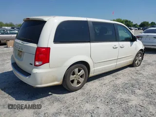 2013 Dodge Grand Caravan SE with VIN 2C4RDGBG9DR516044, listed as a IAAI auction lot 41998893 with 214,645 mi miles and . Bid and sale history available at DreamBid. Image 4.
