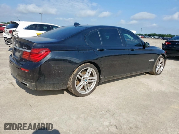 2014 BMW 7 Series 750i с VIN WBAYA8C57ED824970, выставлен на аукционе Copart как лот 61005925 с пробегом 144 457 миль миль и Чистый • Clean title. История ставок и продаж доступна на DreamBid. Изображение 3.