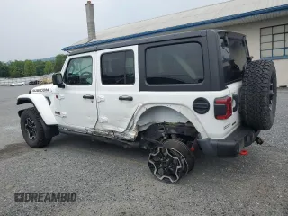 2023 Jeep Wrangler Rubicon with VIN 1C4JJXFM3PW585720, listed as a Copart auction lot 59776305 with 19,190 mi miles and Salvage title. Bid and sale history available at DreamBid. Image 2.