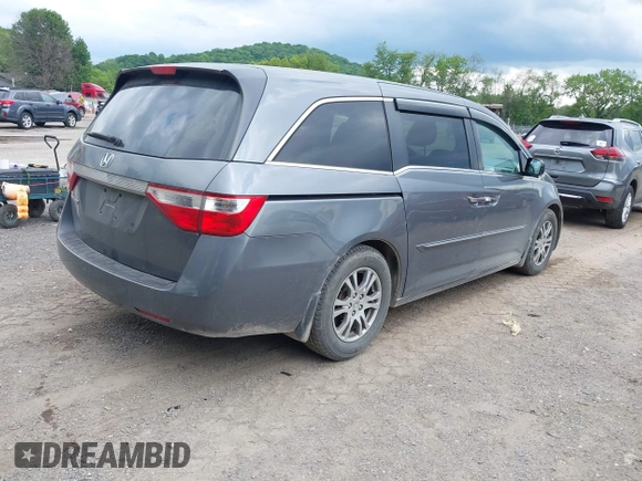 2012 Honda Odyssey EX z VIN 5FNRL5H45CB084342, wystawiony jako IAAI lot #42329303 z przebiegiem 173 711 mil mil oraz . Historia ofert i sprzedaży dostępna na DreamBid. Obrazek 4.