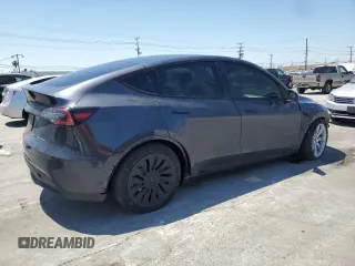 2024 Tesla Model Y Long Range with VIN 7SAYGDEE6RA226035, listed as a Copart auction lot 52539375 with 14,220 mi miles and Salvage title. Bid and sale history available at DreamBid. Image 3.