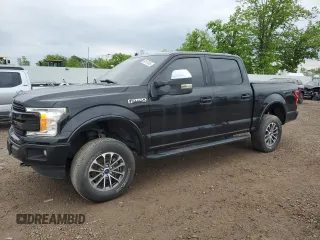2019 Ford F-150 XL with VIN 1FTEW1E49KFC74528, listed as a Copart auction lot 59147435 with 77,198 mi miles and Salvage title. Bid and sale history available at DreamBid. Image 1.