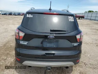 2018 Ford Escape Titanium with VIN 1FMCU9J95JUB31286, listed as a Copart auction lot 58721355 with 100,329 mi miles and Salvage title. Bid and sale history available at DreamBid. Image 6.
