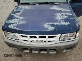 2002 Isuzu Rodeo S с VIN 4S2CK58W624340508, выставлен на аукционе Copart как лот 87872745 с пробегом 144 432 миль миль и Списание • Salvage title. История ставок и продаж доступна на DreamBid. Изображение 14.