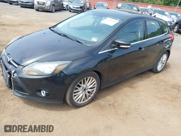 2014 Ford Focus Titanium with VIN 1FADP3N2XEL319782, listed as a IAAI auction lot 42615481 with 132,423 mi miles and . Bid and sale history available at DreamBid. Image 2.