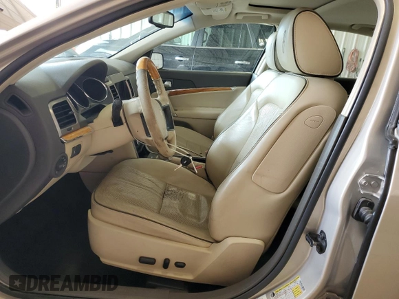2010 Lincoln MKZ с VIN 3LNHL2JCXAR601153, выставлен на аукционе Copart как лот 52599395 с пробегом 79 404 миль миль и Списание • Salvage title. История ставок и продаж доступна на DreamBid. Изображение 7.