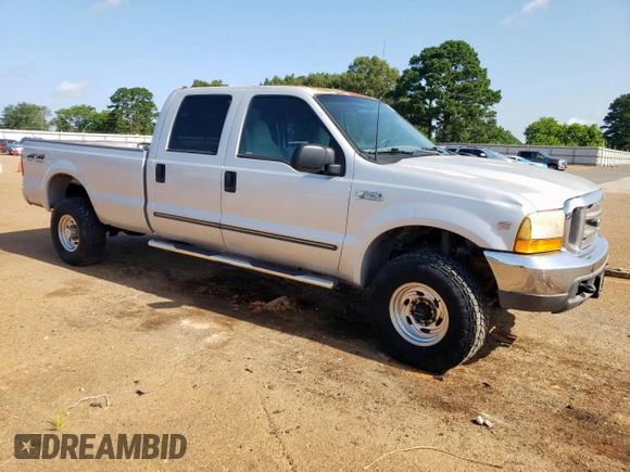 1999 Ford F-350 XL with VIN 1FTSW31S2XEE89071, listed as a Copart auction lot 61016685 with 115,130 mi miles and Salvage title. Bid and sale history available at DreamBid. Image 4.